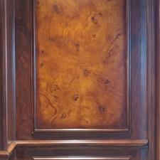 Faux burl panels and wood grained walls